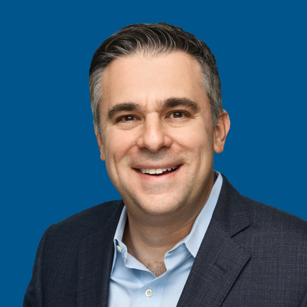 Stephen_Schiavo seen in a blue color shirt and black color suit
